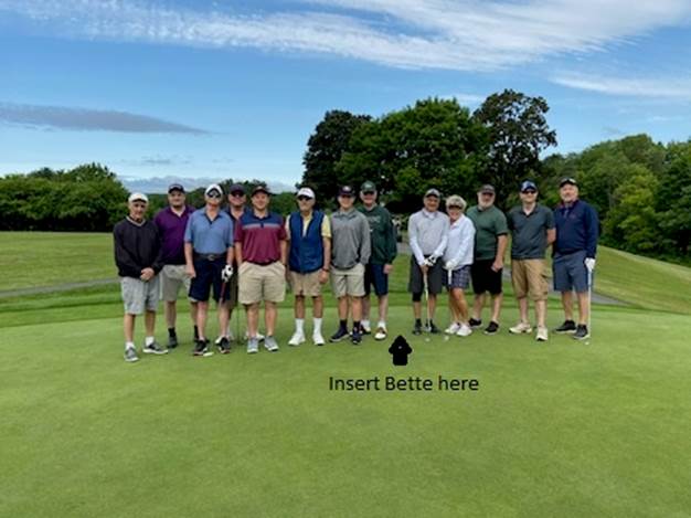 A group of men standing on a golf course

Description automatically generated with medium confidence
